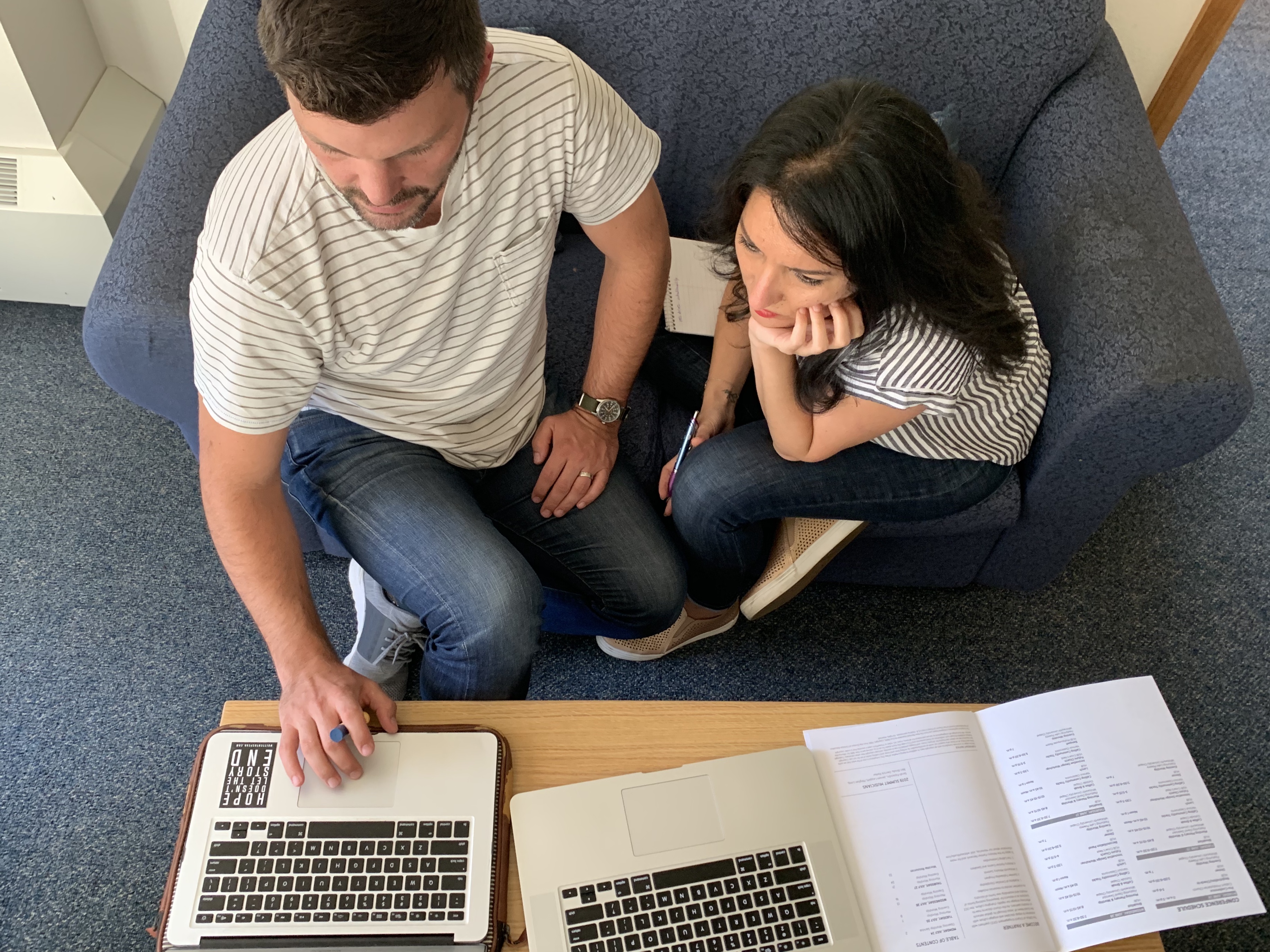 Bobby Harrison and Inés Velásquez-McBryde working together on their laptops